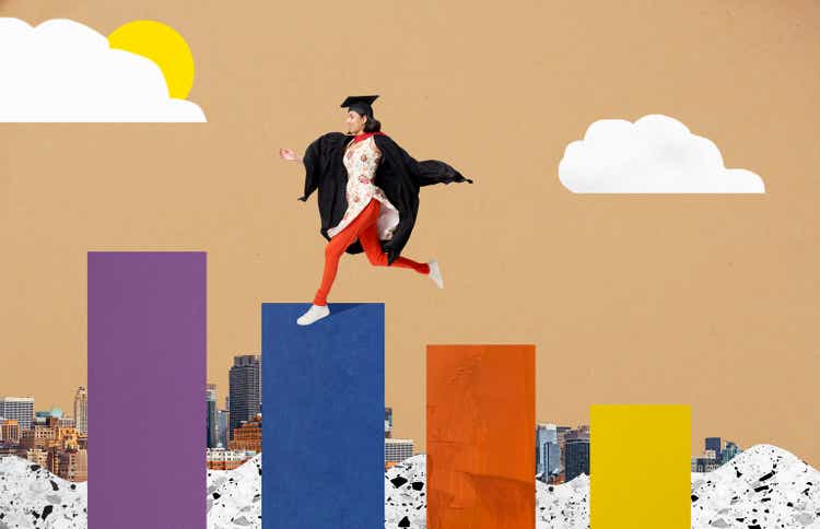 female graduate running