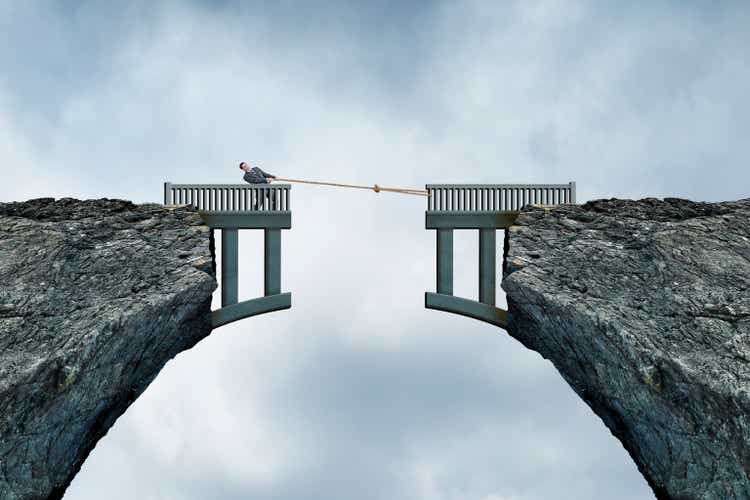 Man Using Rope To Bridge The Gap