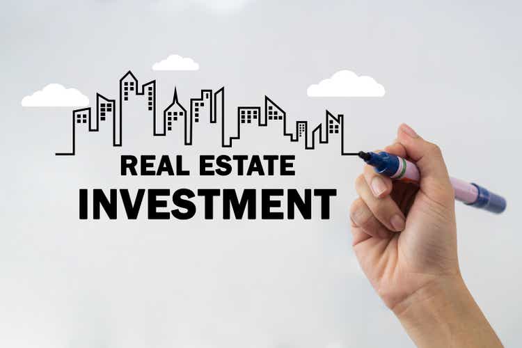 Real estate investment graphic with skyscrapers and clouds.