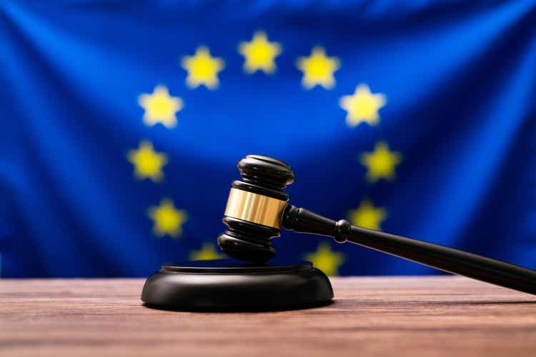 Wooden hammer and European Union flag