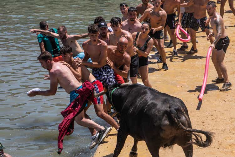 At "Bous A La Mar", Revelers Take Plunge To Dodge Bulls And Beat The Heat