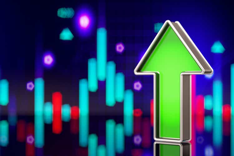 Financial Trading Concept with Green UP Arrow and a Stock Market Chart as a Background