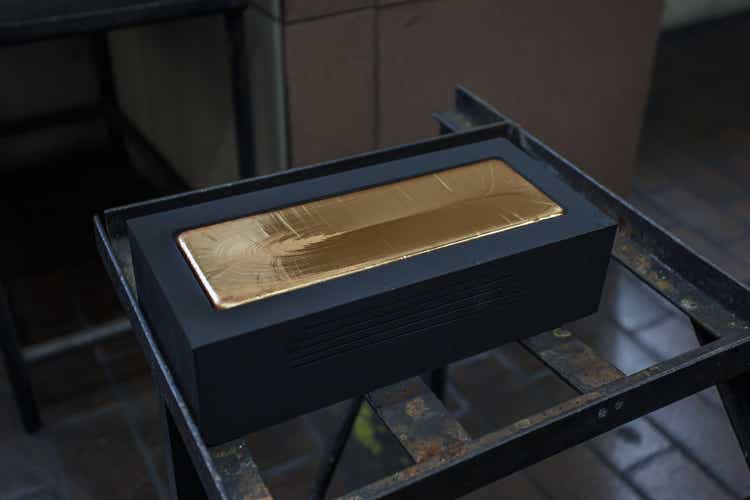 Bar of gold in the mold.