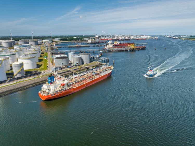 Crude Oil Liquid Cargo Transporter Ship Unloading Petrochemicals to a Fuel Depot