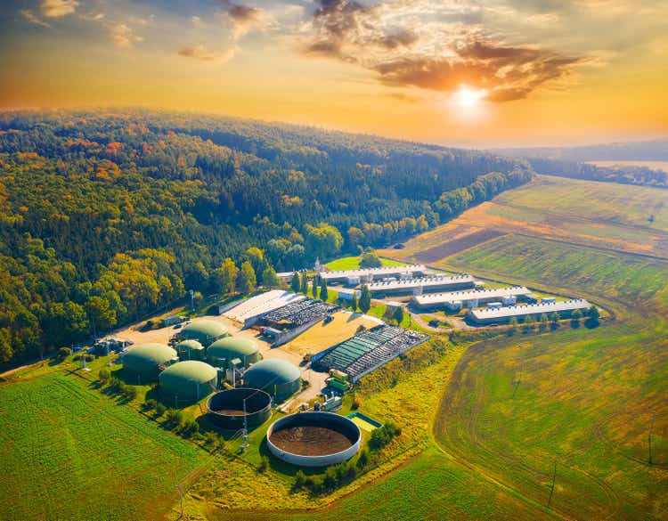 Biogas plant in agricultural landscape.