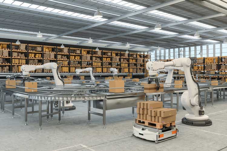 Distribution Warehouse With Automated Guided Vehicles And Robots Working On Conveyor Belt
