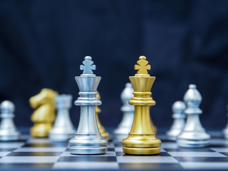 chess king gold and white paired for concept, competition and strategy