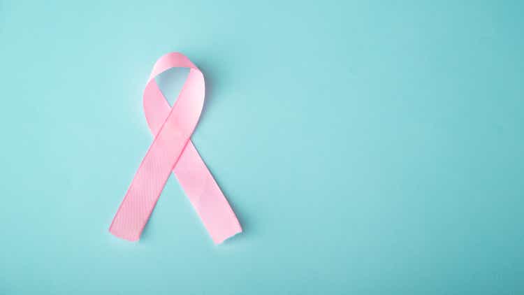 pink ribbon breast cancer on blue background