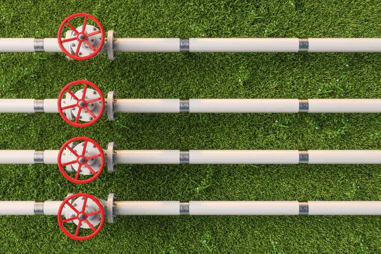 Aerial View Of Gas Or Pipe Line Valves On Grass