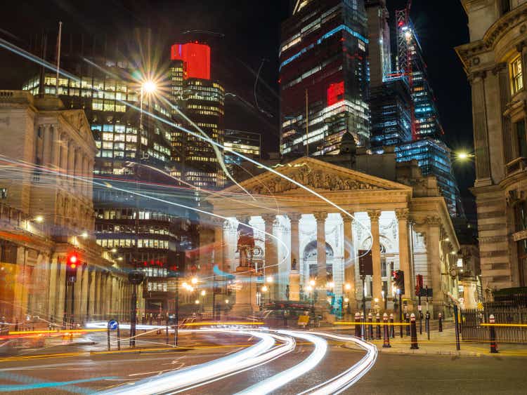 City of London Bank of England overlooked by skyscrapers night