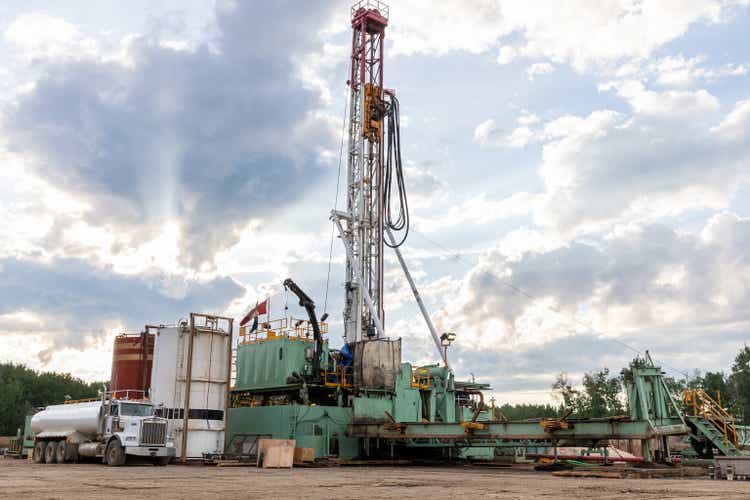 Super Single Oil and Gas Drilling Rig at a drilling Pad, Alberta, Canada.