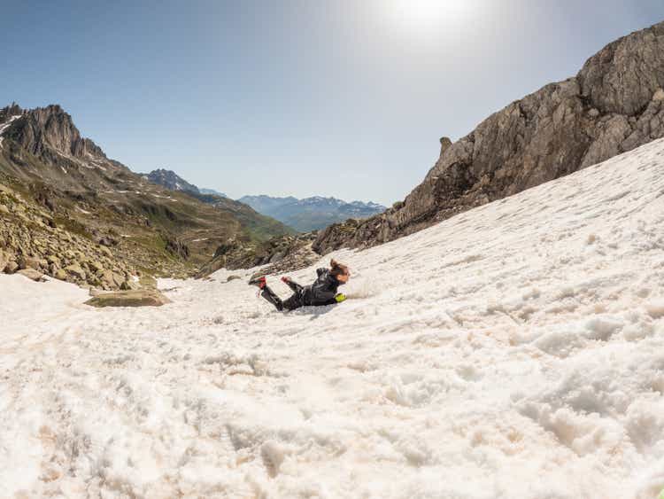 Mountaineer training to fall on glacier