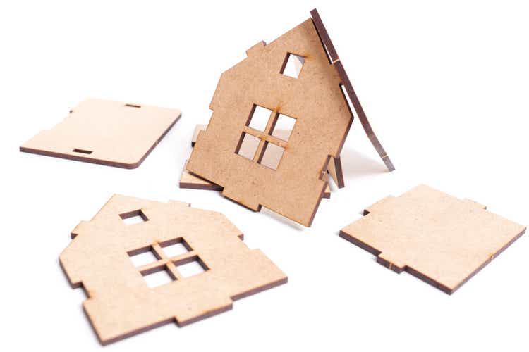Toy house elements on white