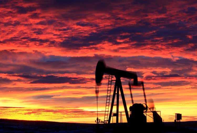 Oil Pumpjack Silhouette In Alberta