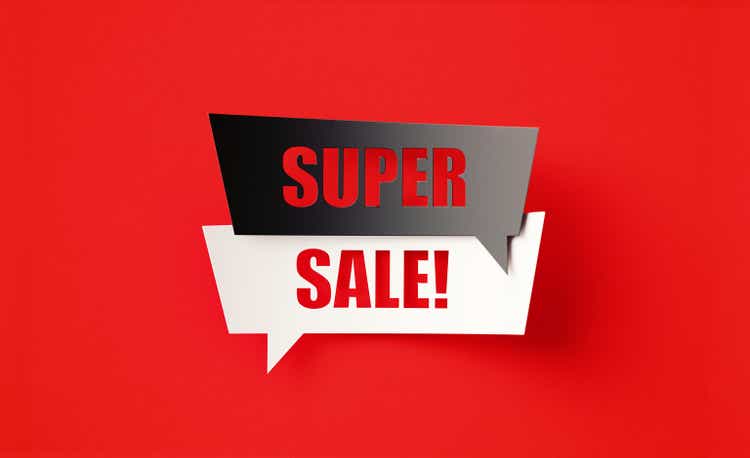 Super Sale Written Cut Out Black And White Speech Bubbles Sitting Over Red Background
