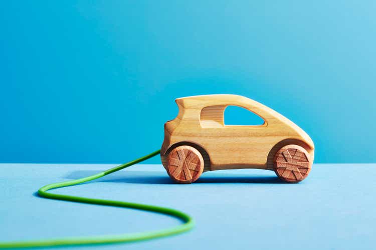 A wooden electric car