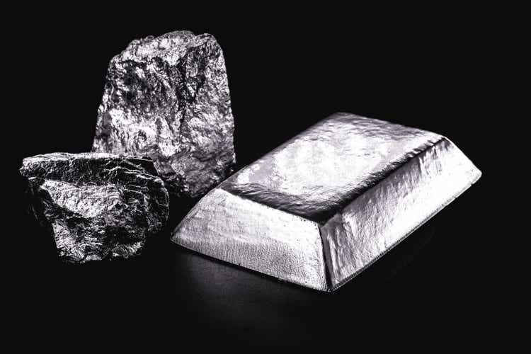 palladium stone and ingot, a transition metal used in the production of aerospace equipment, black background, isolated