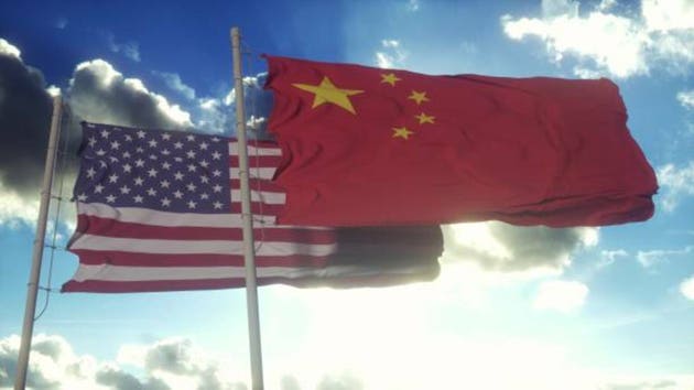 China and USA flag on flagpole. China and United States waving flag in wind. China and United States diplomatic concept. 3d illustration