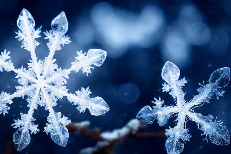 Beautiful snowfall flake crystal with snowfall background
