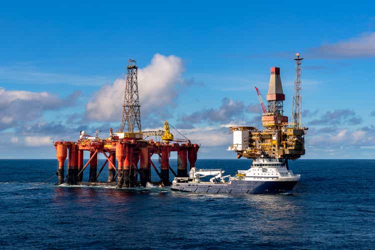 AHTS vessel Island Valiant carries out equipment transfer operations for the semi-submersible rig Borgsten Dolphin alongside the Dunbar platform.