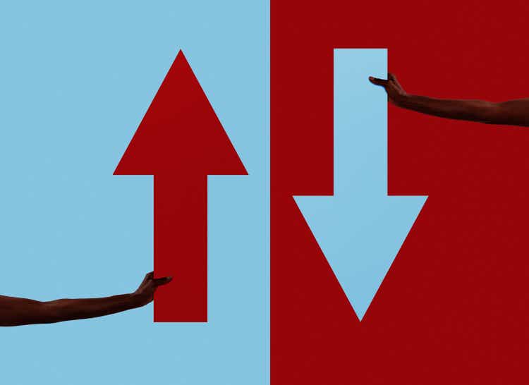 Up and down arrow symbol being held