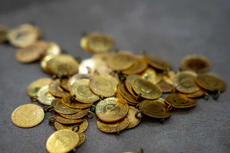 Gram gold coins weighed on precision scales