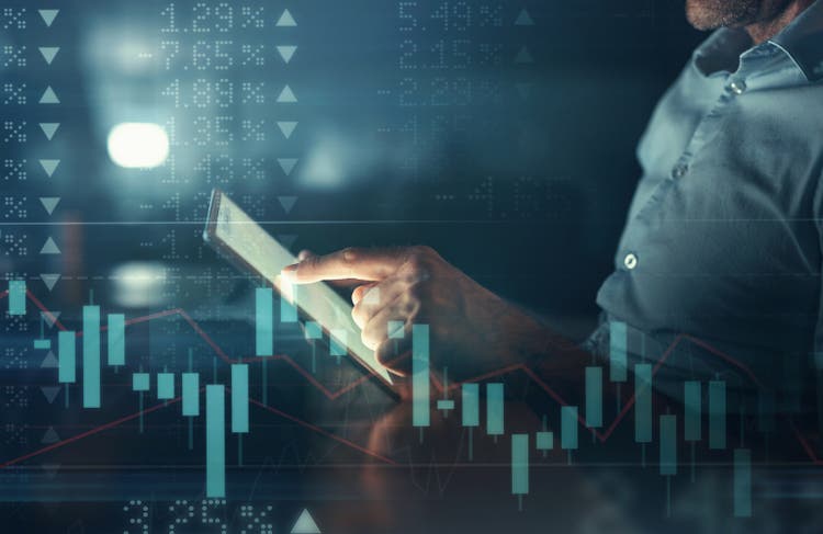IT businessman with tablet and trading infographic chart or big data analytics for finance software and screen overlay. Information technology digital expert or trader in corporate fintech statistics