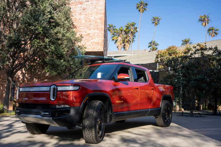 Rivian R1T Electric Truck with a SUP and Surfboard Mount