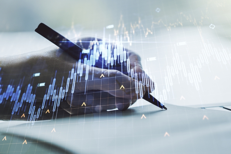 Multi exposure of abstract financial diagram with world map and with man hand writing in notepad on background, banking and accounting concept