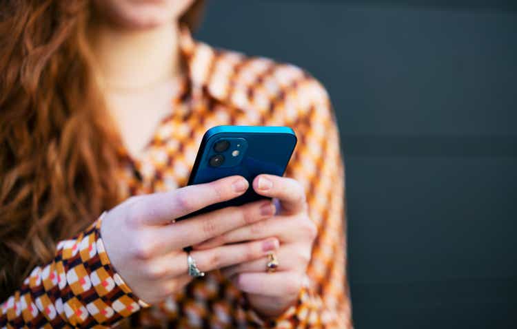 Close up of woman using smart phone