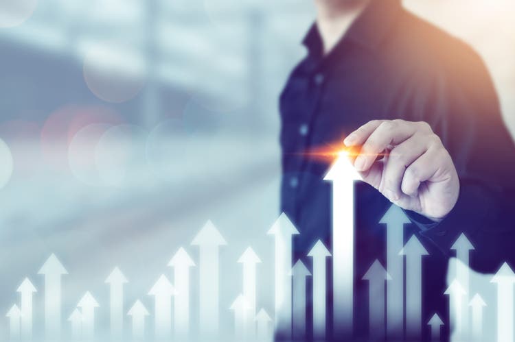 Business development to success and growing growth concept. Businessman pointing arrow graph corporate future growth plan