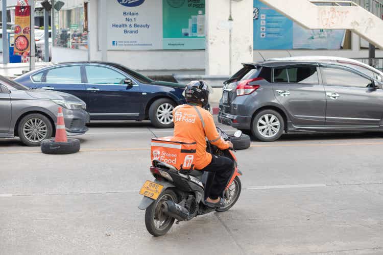 Shopee Food express delivery person on a motorbike