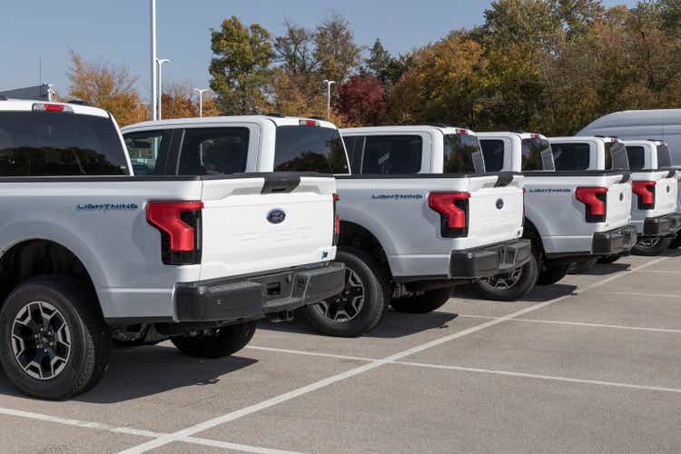 Ford F-150 Lightning fleet display. Ford offers the F150 Lightning all-electric truck in Pro, XLT, Lariat, and Platinum models.