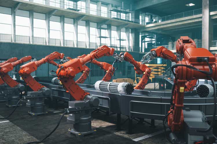 Robot Workers In Factory