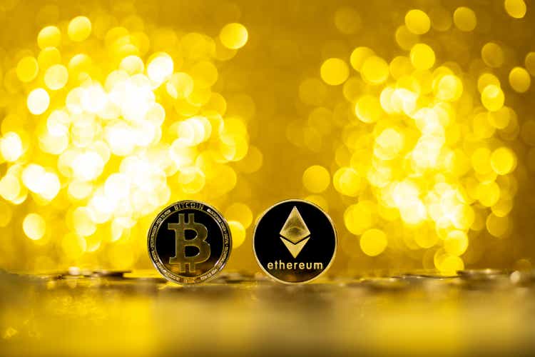 Ethereum and Bitcoin cryptocurrency on shiny background