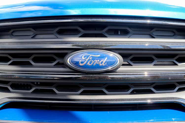 Close up of the Ford logo on a car