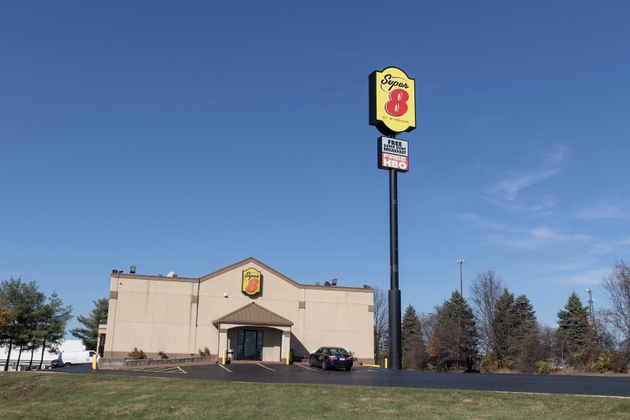 Super 8 Motel. Super 8 is a subsidiary of Wyndham Worldwide.