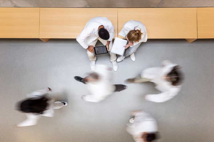 Scientists walking in the corridor