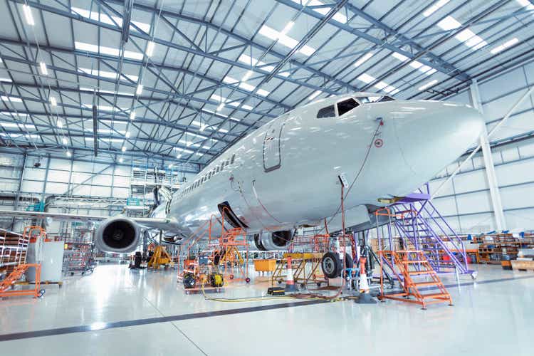 Large aircraft in aircraft maintenance hangar