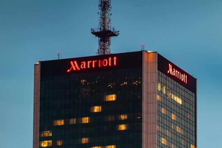 Illuminated Marriott brand logo and sign.