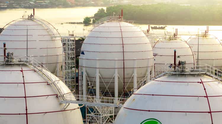 Industrial gas storage tank. LNG or liquefied natural gas storage tank. Energy price crisis. Gas tank in petroleum refinery. Energy crisis. Natural gas storage industry and global market consumption.