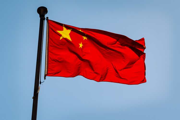 Chinese national flag against blue sky