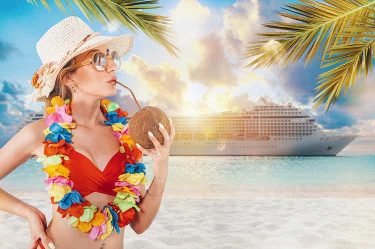 Woman enjoys the summer traveling with a cruiseship