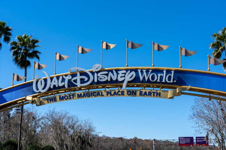 A Walt Disney World arch gate on the road in Orlando, Florida, USA.