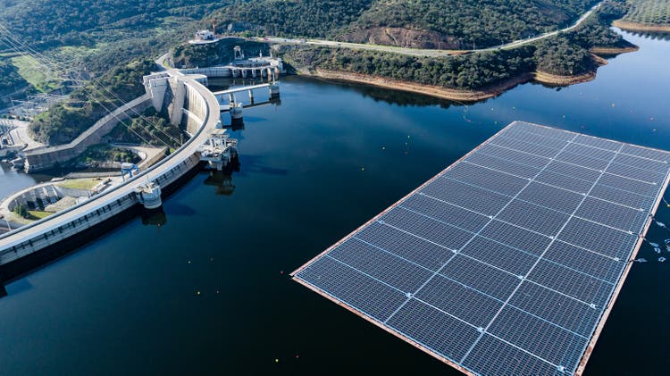 Aerial images of solar power floating in the water implemented in southern Portugal, close to the dam