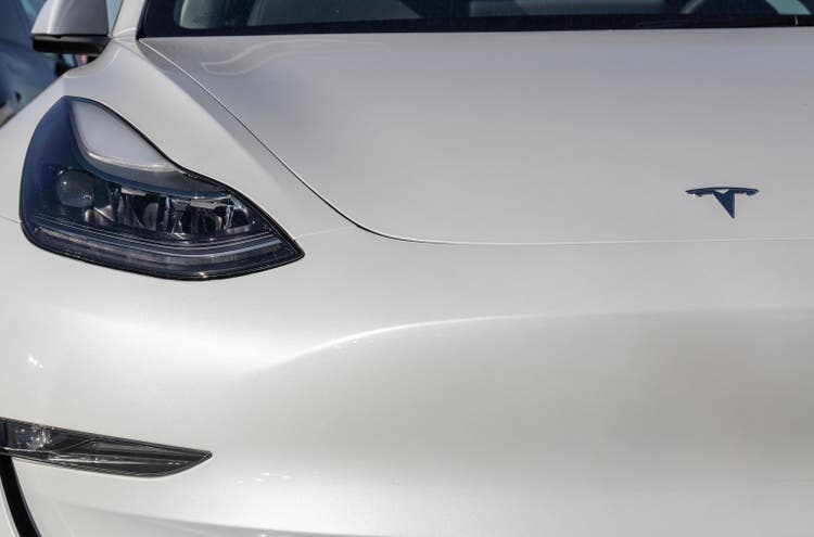 Tesla EV electric vehicles on display. Tesla products include electric cars, battery energy storage and solar panels.