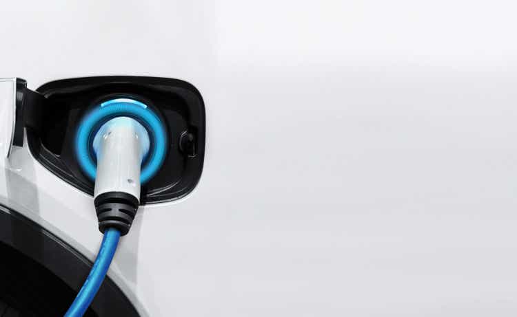 Electrical car charger, White electric car charging with copy space, Technology electric vehicle concept