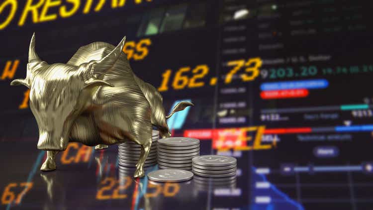 The golden bull and coins on business background 3d rendering