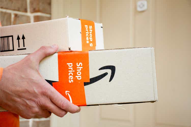 Amazon prime boxes delivered to a front door of residential building.