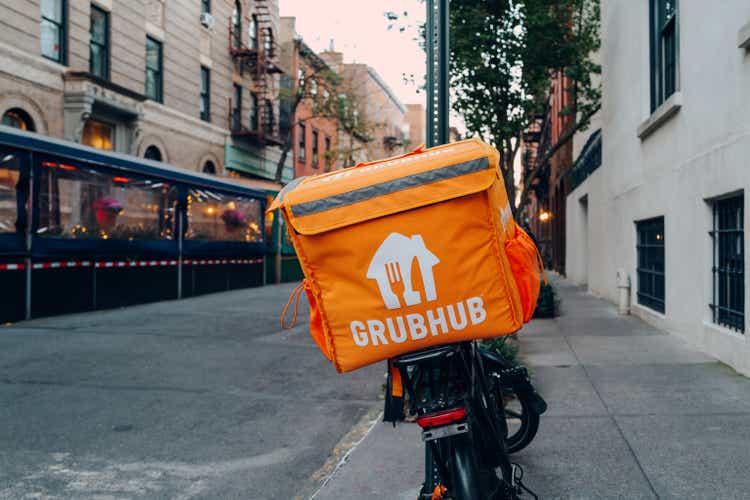 Grubhub bag on a delivery bike on a street in Manhattan, New York, USA.